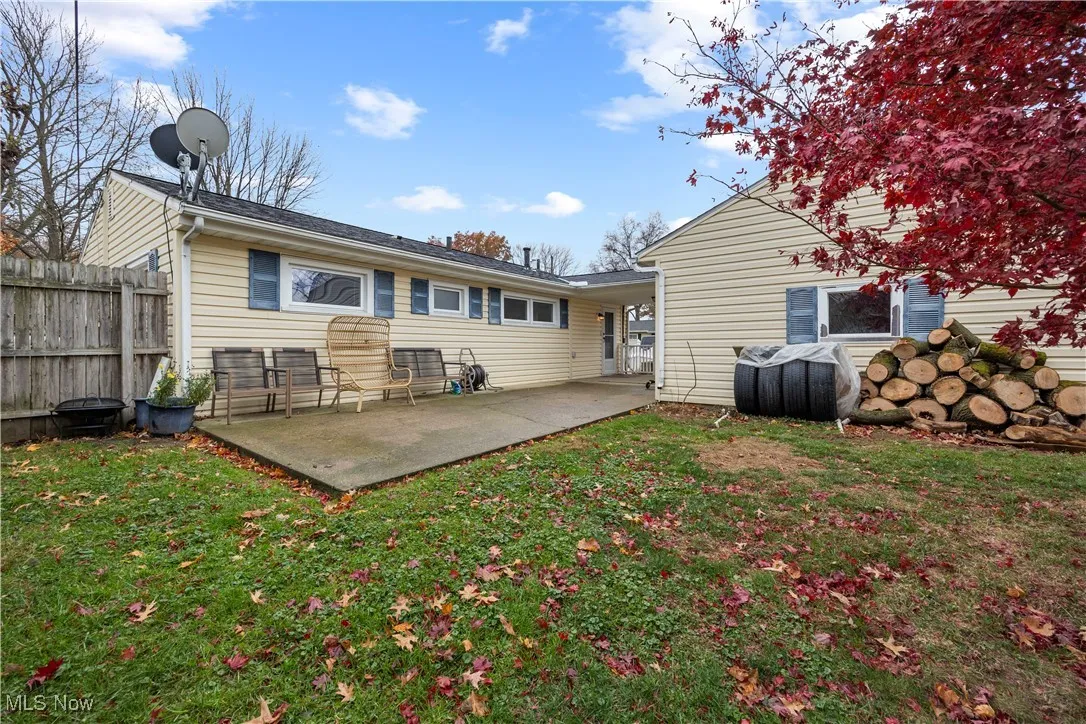 Back of house with a patio