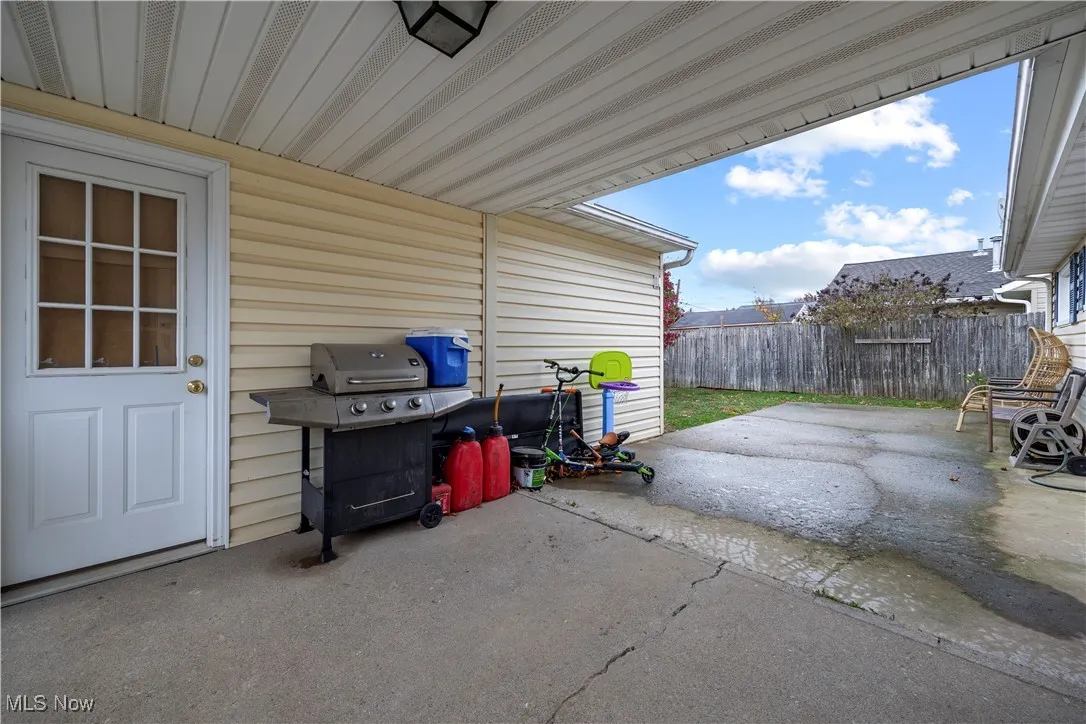 View of patio featuring area for grilling