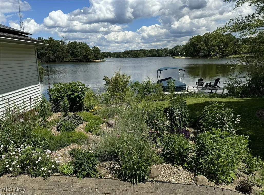 Water view with a boat dock