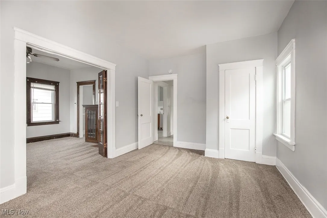 Unfurnished bedroom featuring carpet