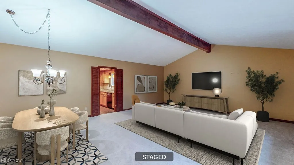 Virtually staged Living room with carpet flooring and a chandelier