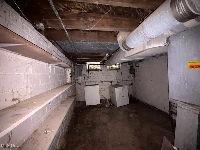 Basement featuring washer / clothes dryer and electric panel