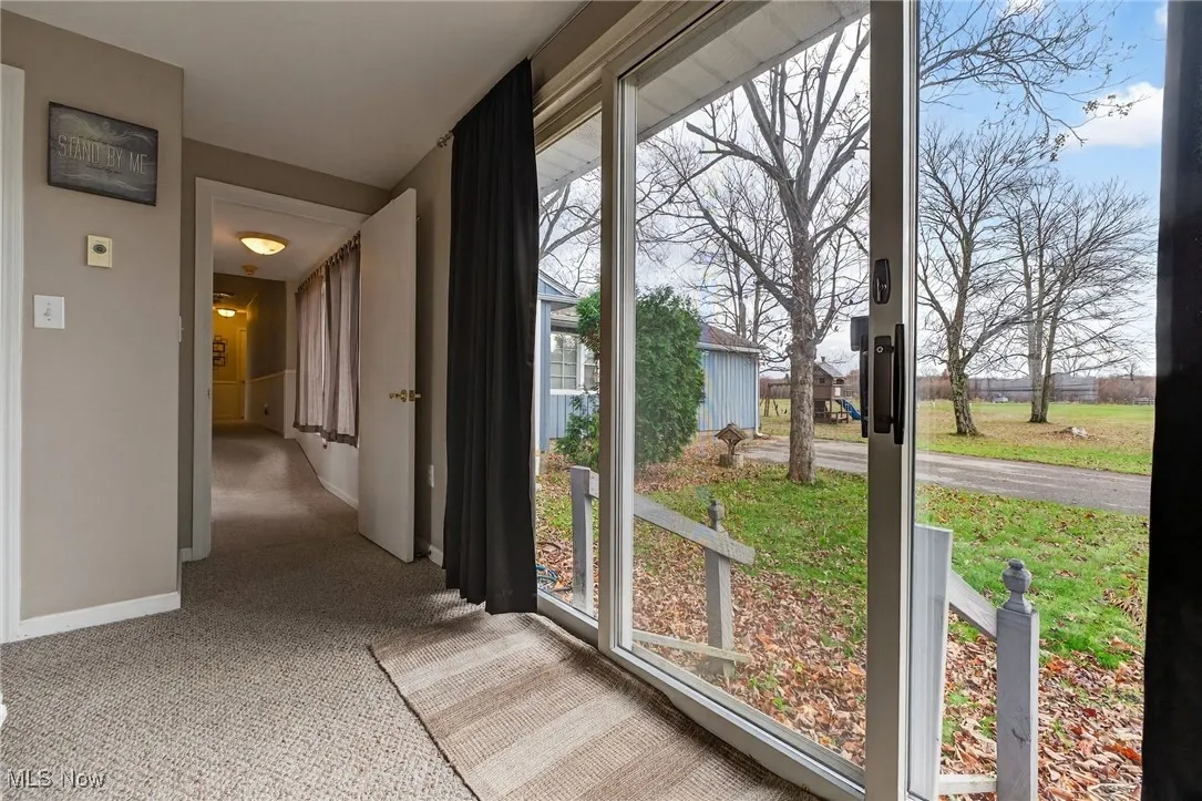 Primary bedroom with access to backyard