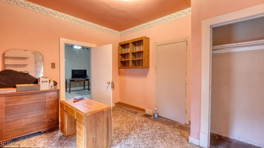 Home office featuring baseboards