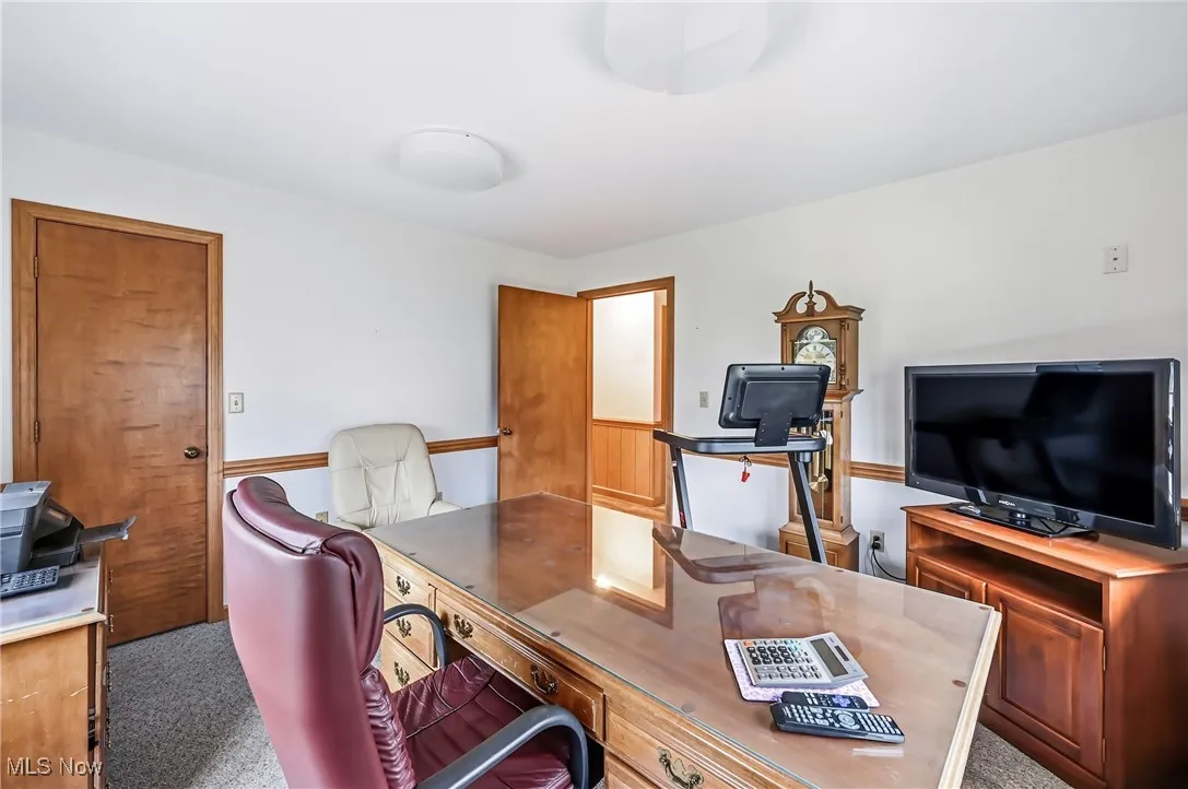 Office space featuring carpet flooring