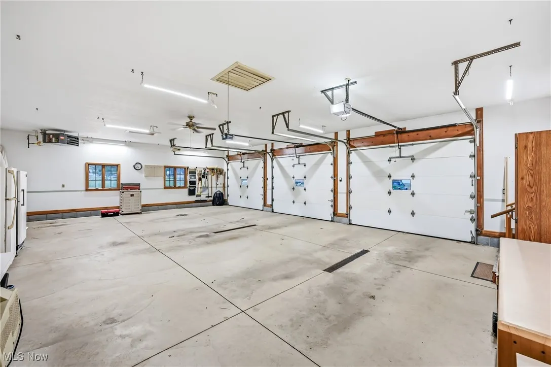 Garage with a heating unit and a garage door opener