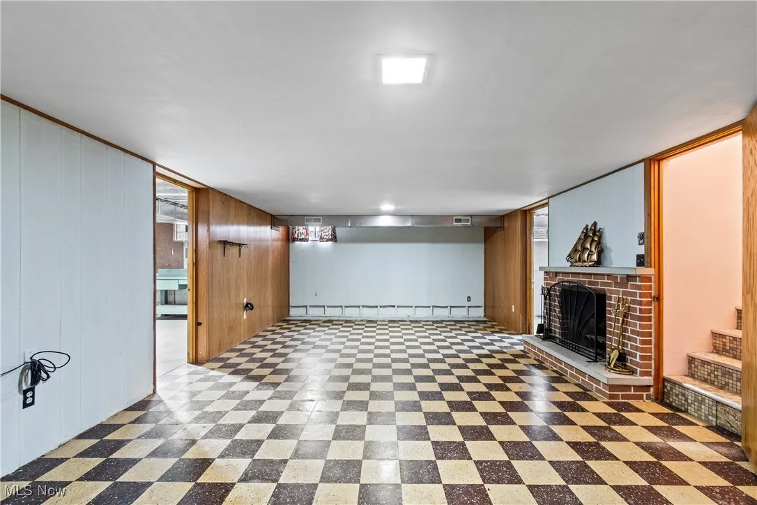 Basement has rec room with fireplace (not used by current owner).