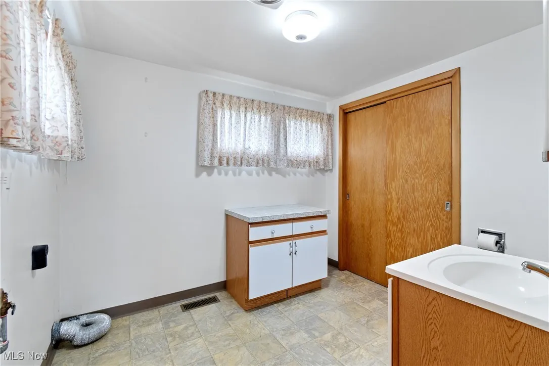 First floor laundry plus half bath.