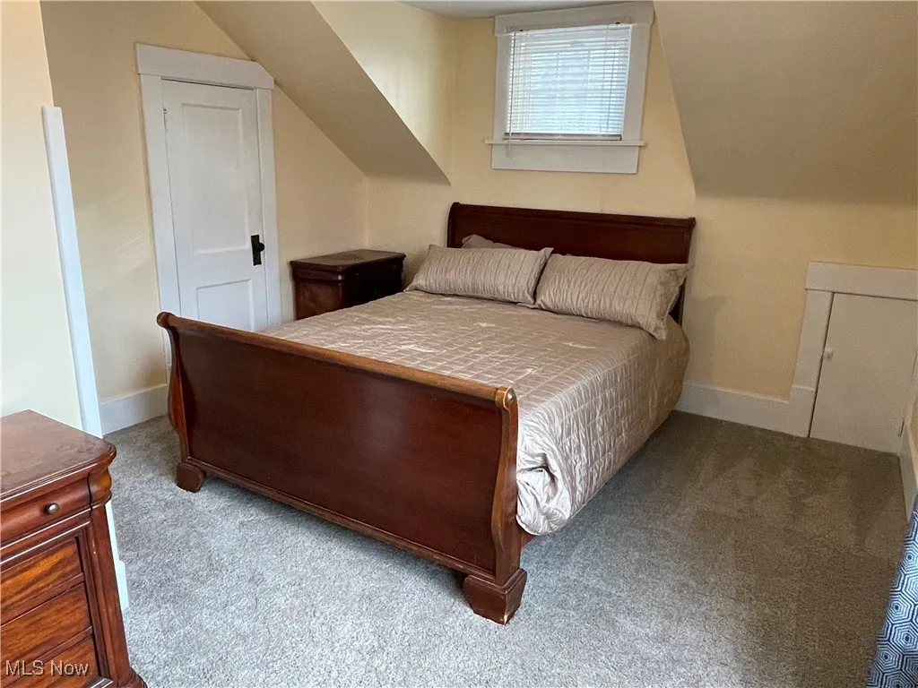 Bedroom featuring carpet
