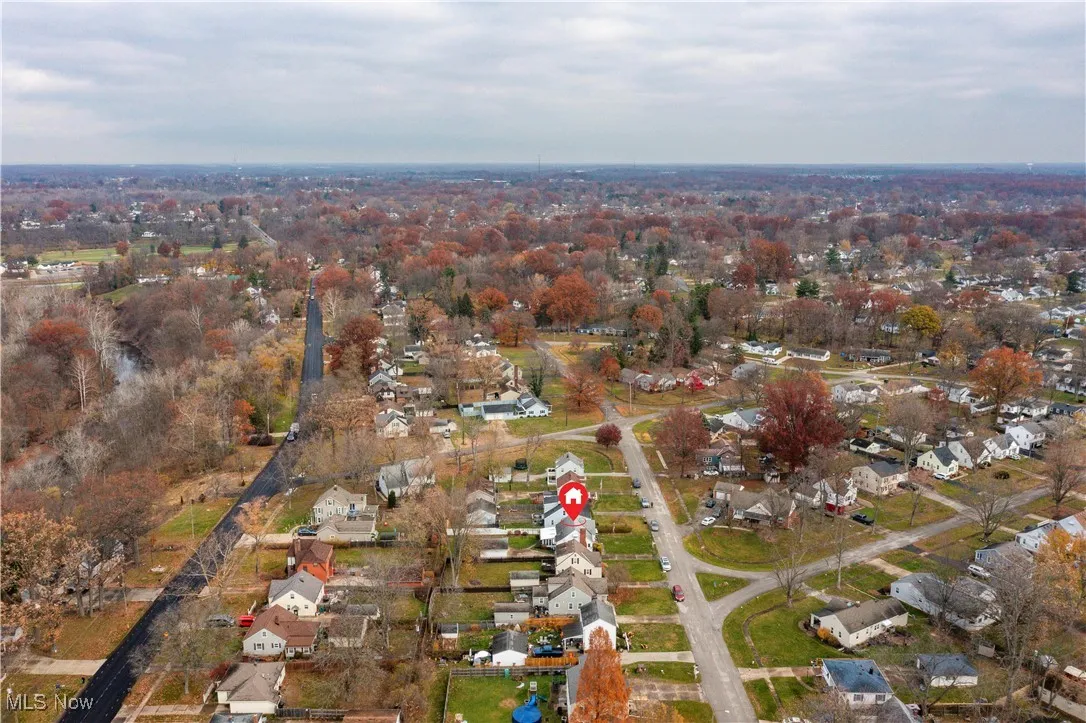 View of property location with nearby suburban area