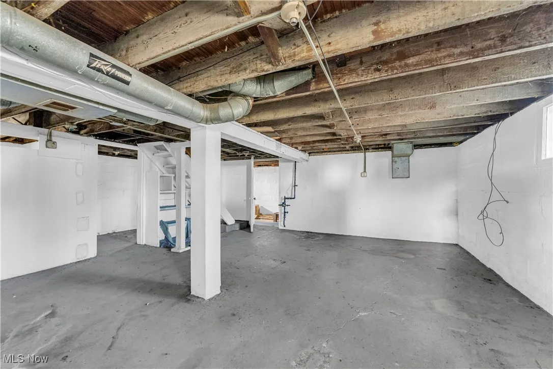 Unfinished below grade area with stairs