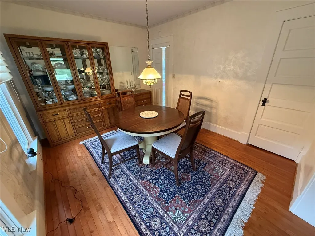 Dining room featuring wood-type flooring