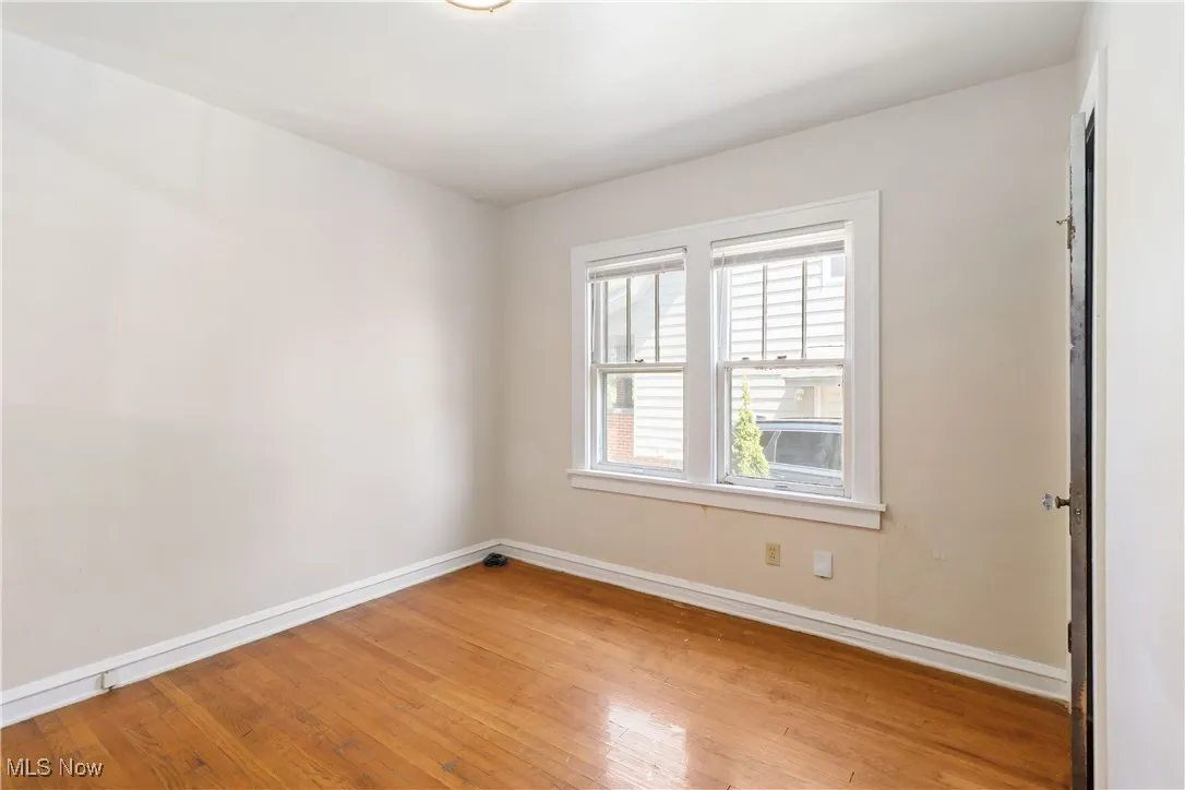 1st Floor room with baseboards and light wood-style flooring