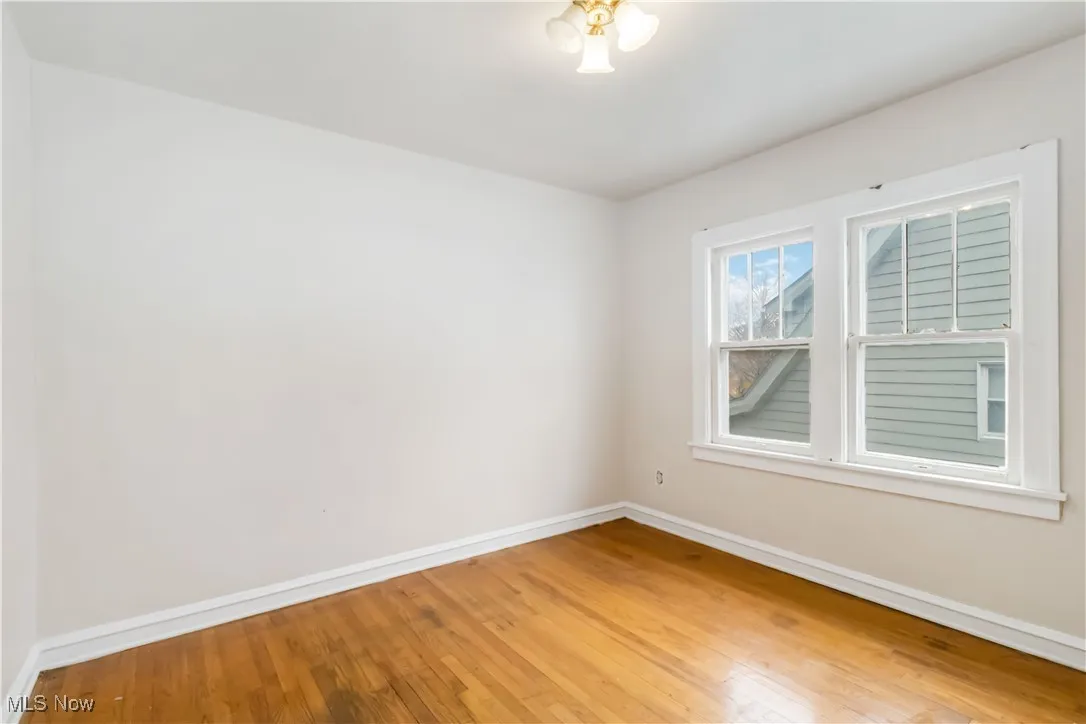 2nd floor room featuring baseboards and light wood finished floors