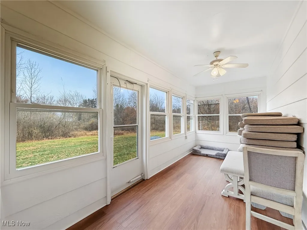 Sunroom featuring wood lvt floors