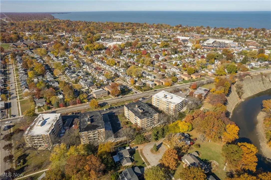 Aerial overview of property's location with a nearby body of water