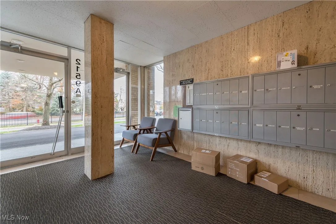 Lobby featuring wallpapered walls