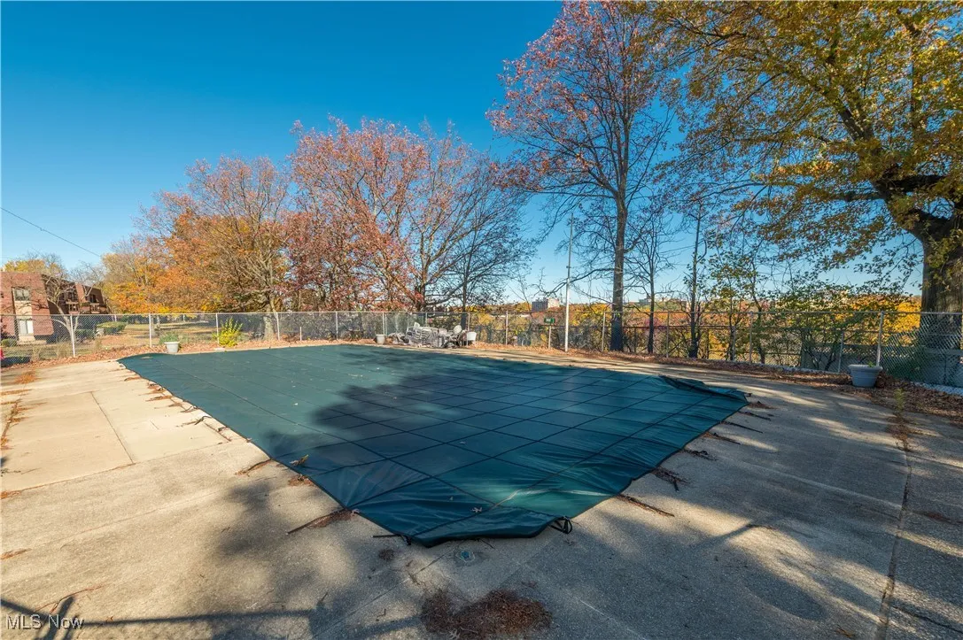 Community pool featuring a patio area
