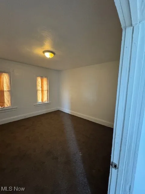 Spare room with baseboards