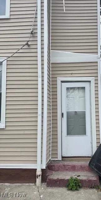 View of exterior entry to basement