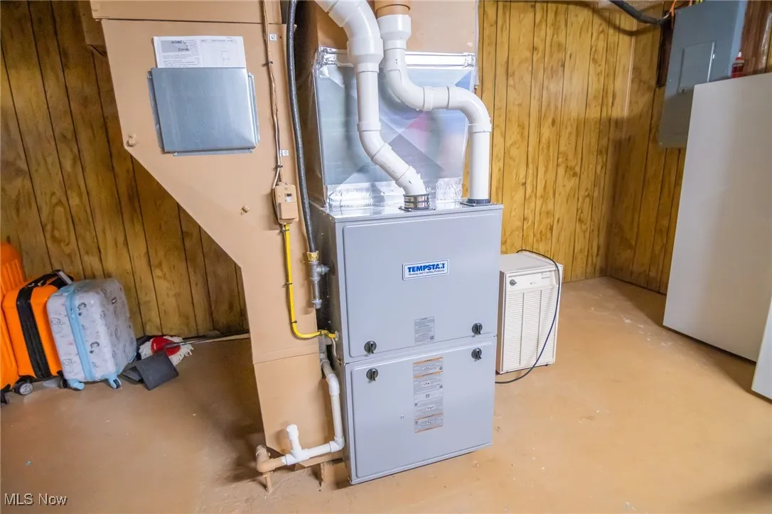 Utilities with electric panel and heating unit