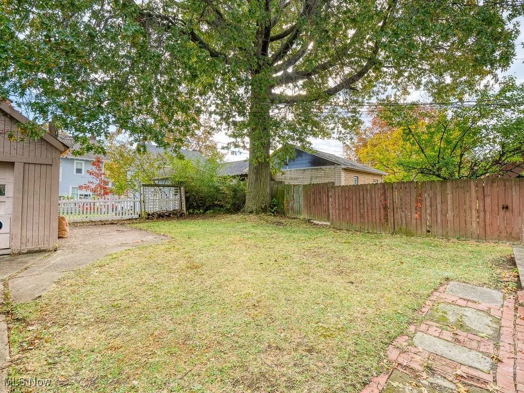 View of fenced backyard