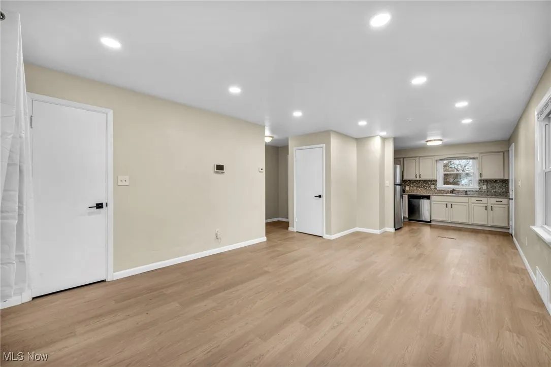 Unfurnished living room with recessed lighting and light wood-style floors