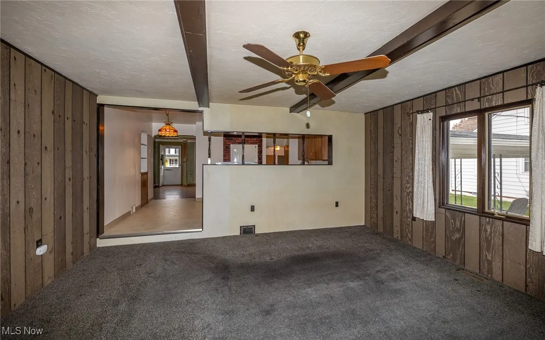 Den located off the kitchen.