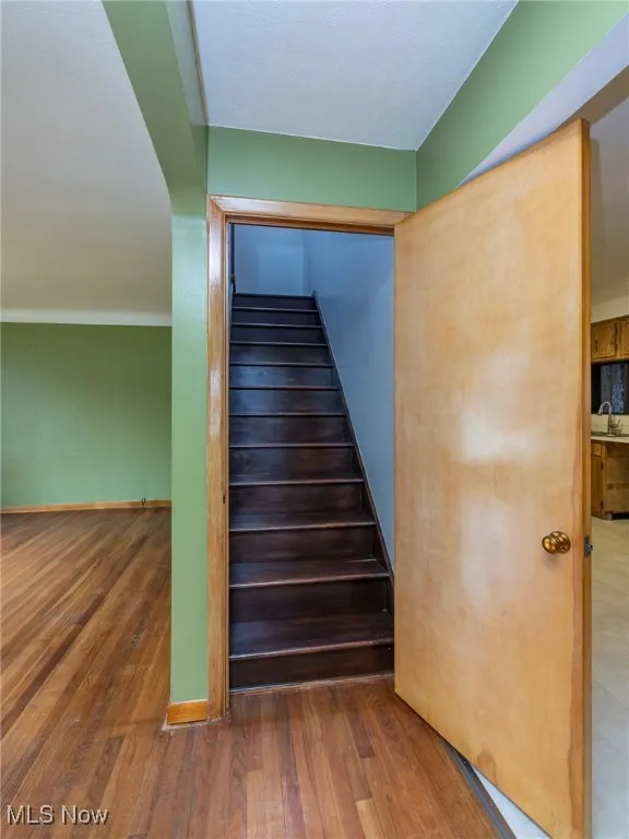 Staircase to the 3rd bedroom and storage room