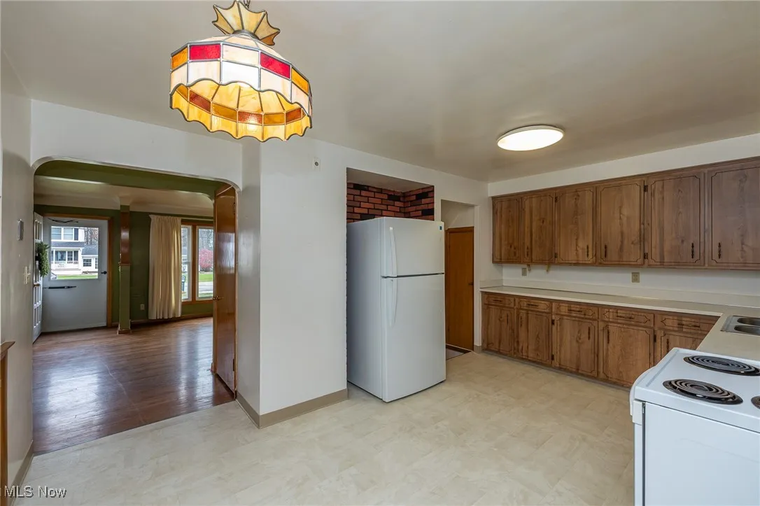 Eat- in Kitchen with entry to the garage and basement