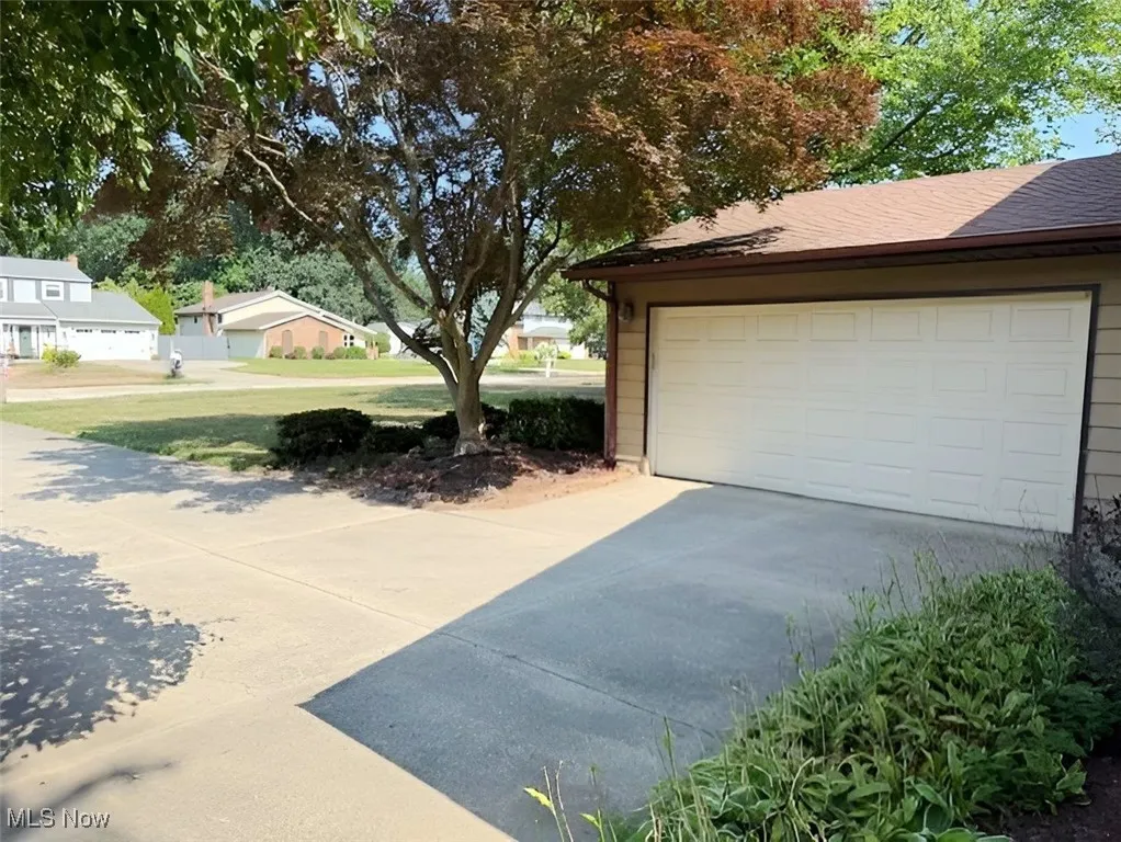 Garage featuring a residential view