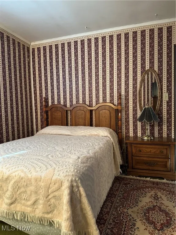 Bedroom with crown molding