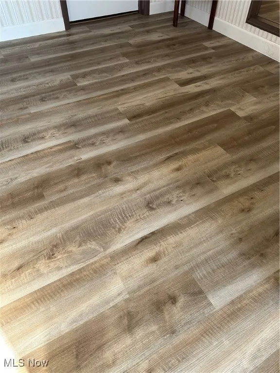 Detailed view of Luxury vinyl floors in Family room, kitchen and bathroom areas