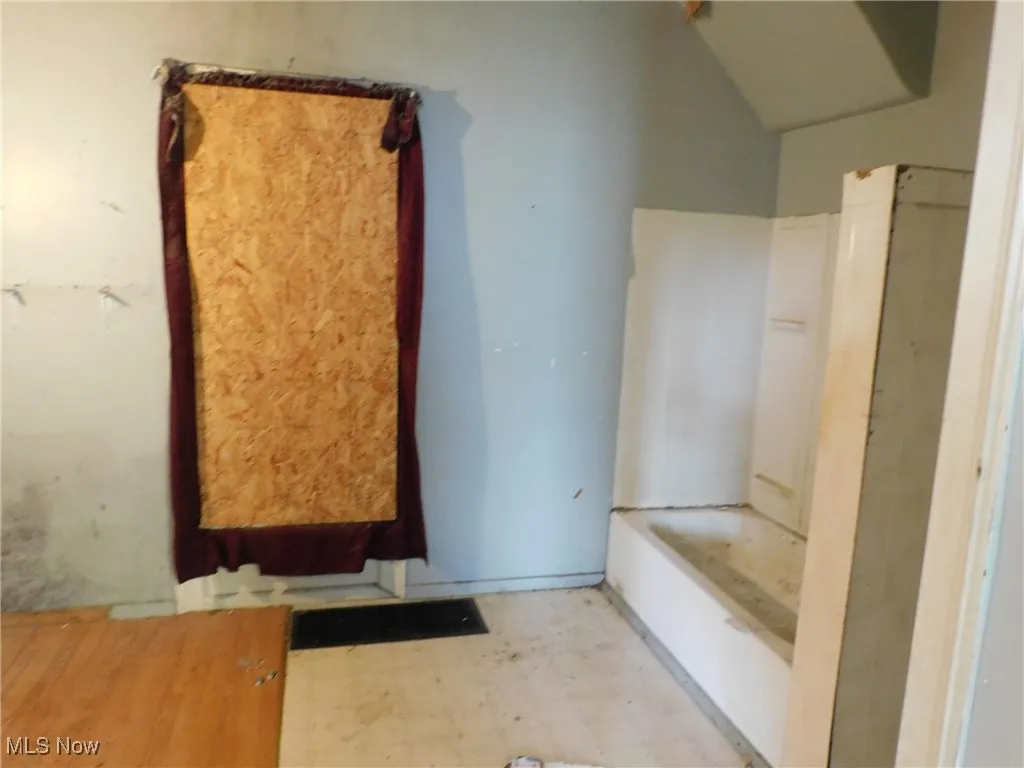 Full bath 1 1st floor view A with a bath and light floors