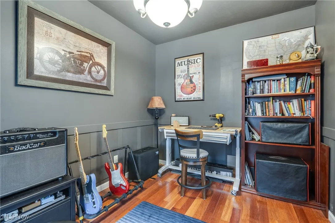 Office with wood finished floors