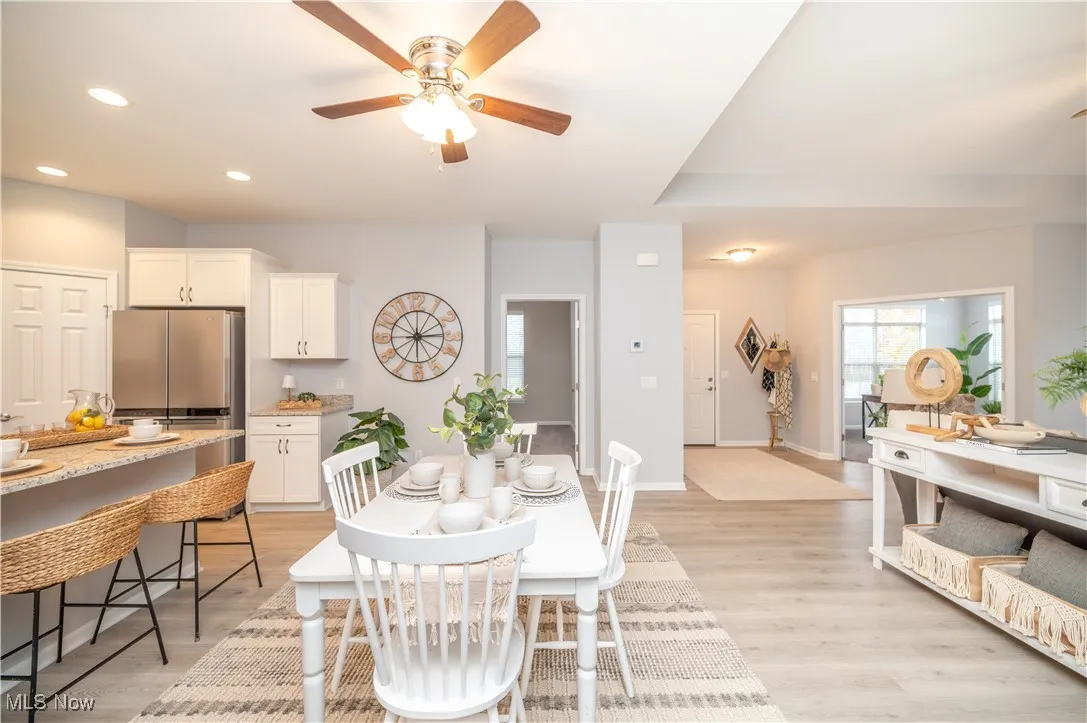 Dining area looking into kitchen and family room area