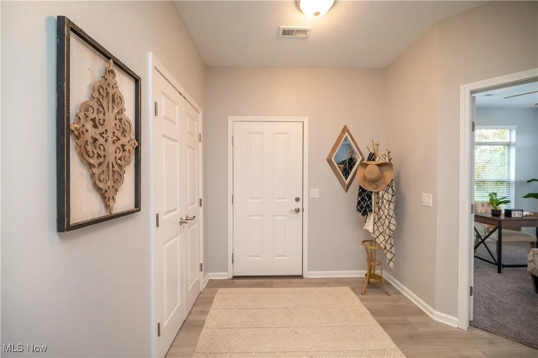 Front door entrance with coat closet