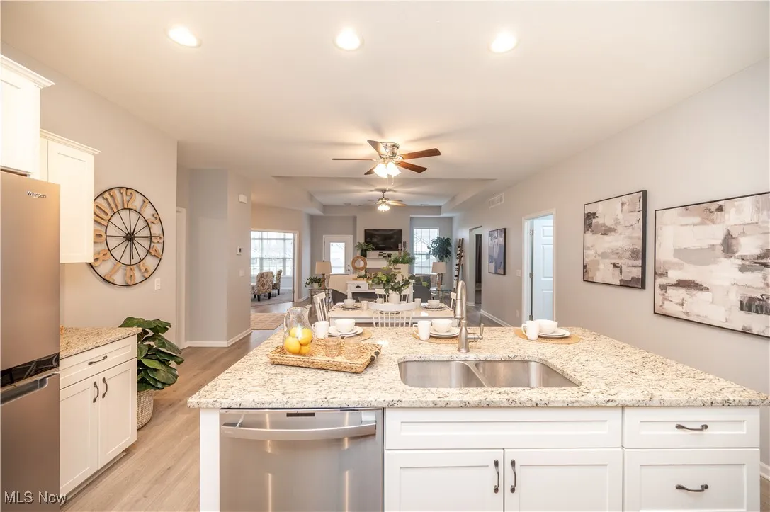 Kitchen with granite countertops, stainless steel appliances