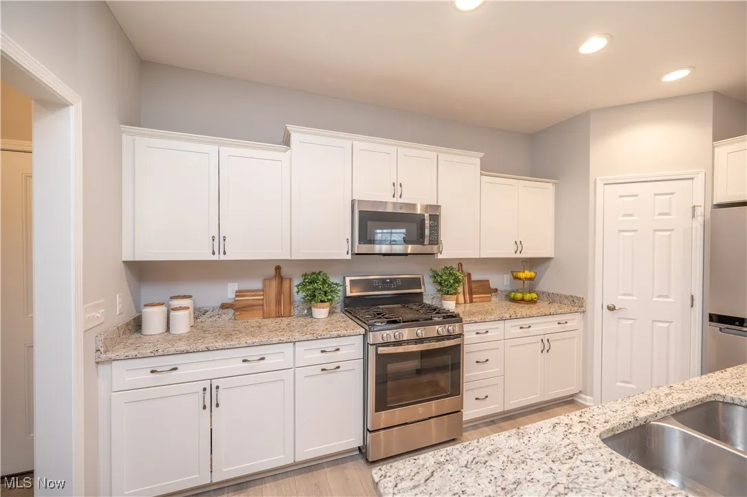 Kitchen area with stainless steel appliances