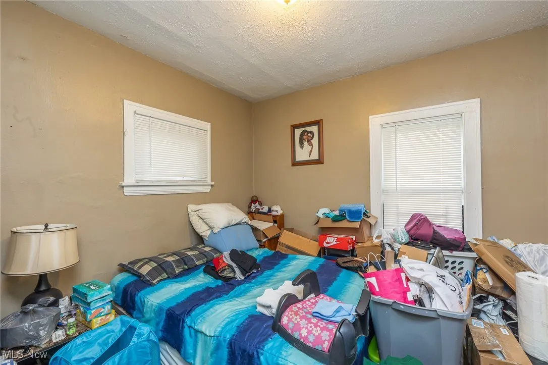 Bedroom featuring a textured ceiling