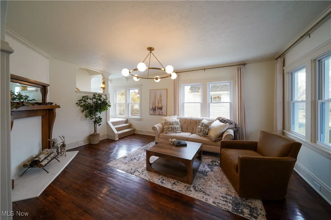 Living room with restored hardwood floors.