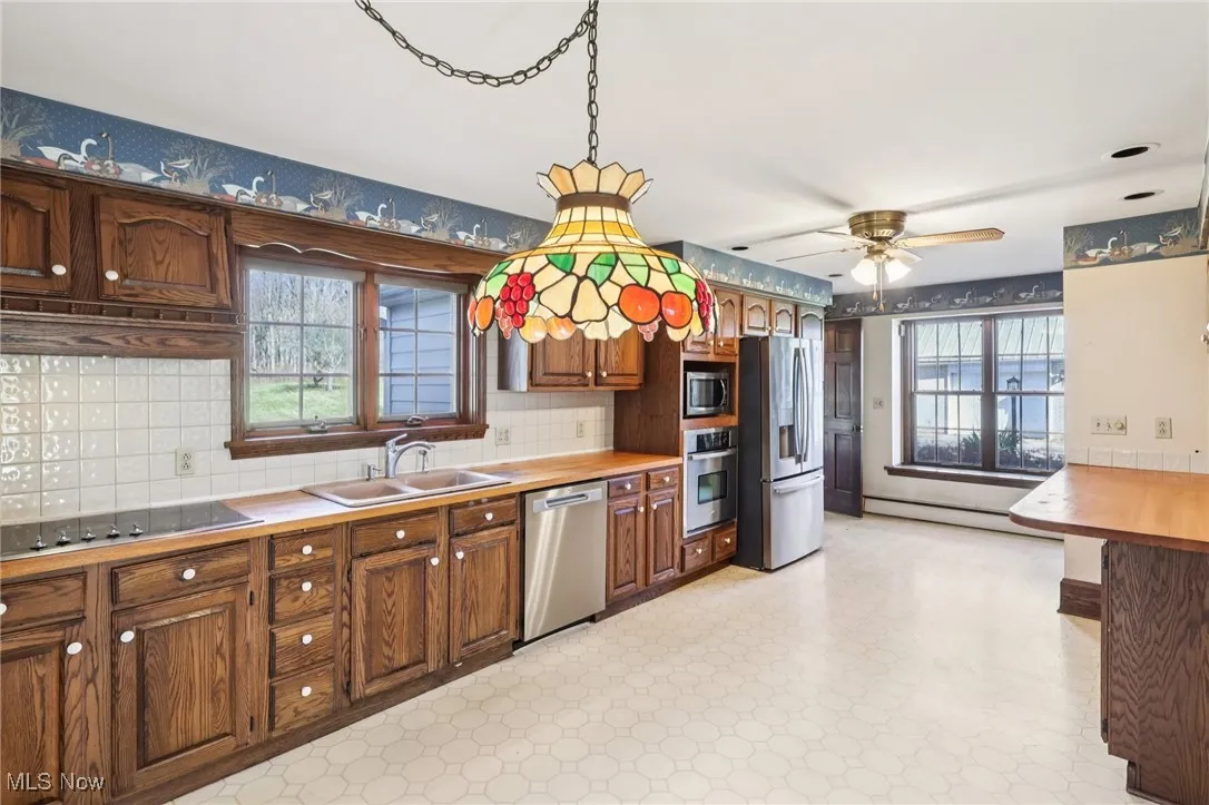 Eat In Kitchen with Breakfast Bar and Main Floor Laundry