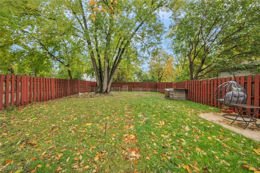 View of fenced backyard