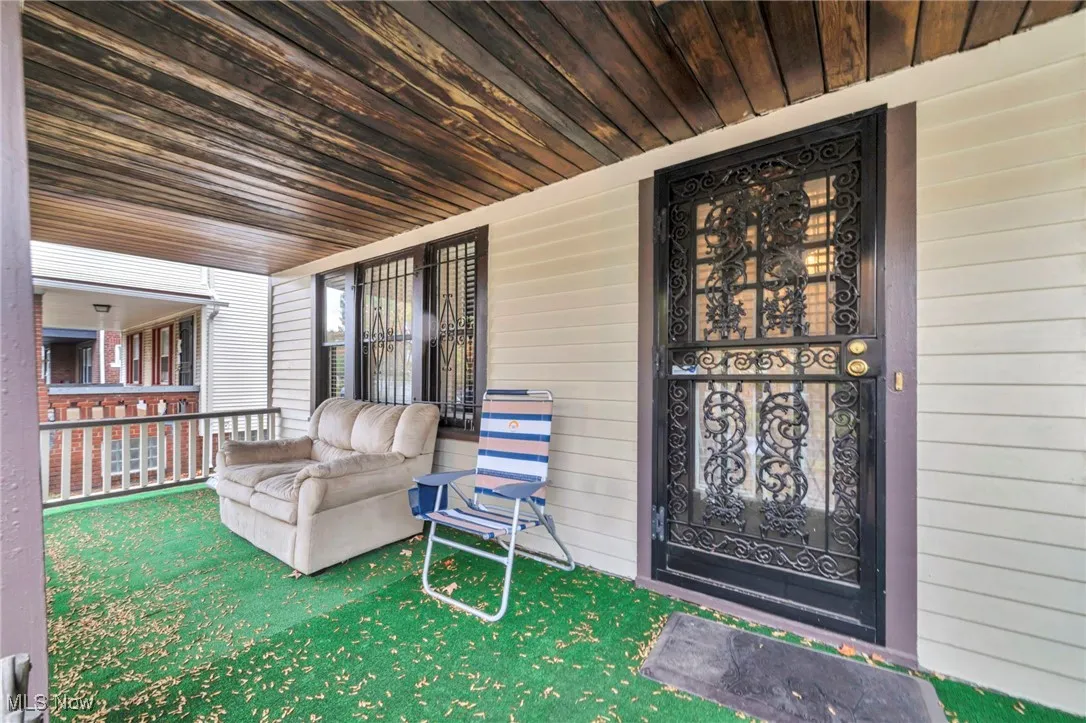 Property entrance with a porch