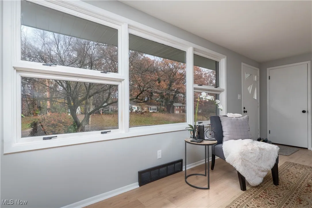 Living area featuring light wood-style floors