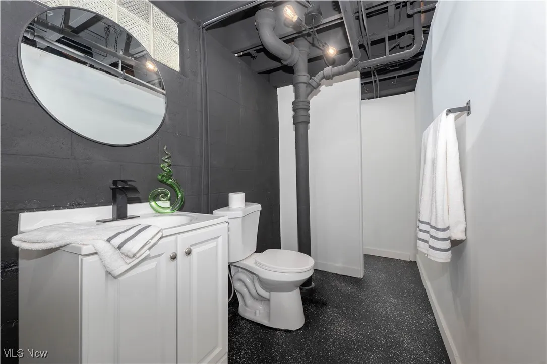 Bathroom with vanity in bsmt