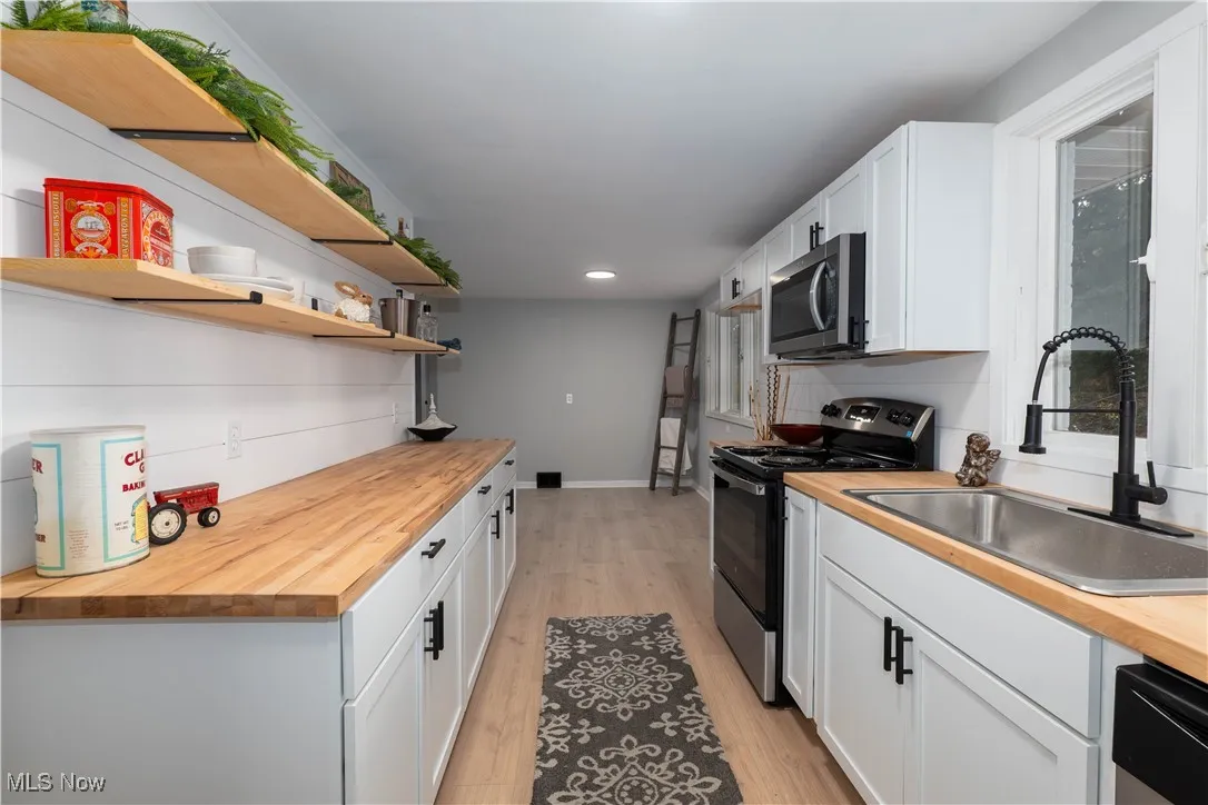 Kitchen featuring Butcher Block Counters