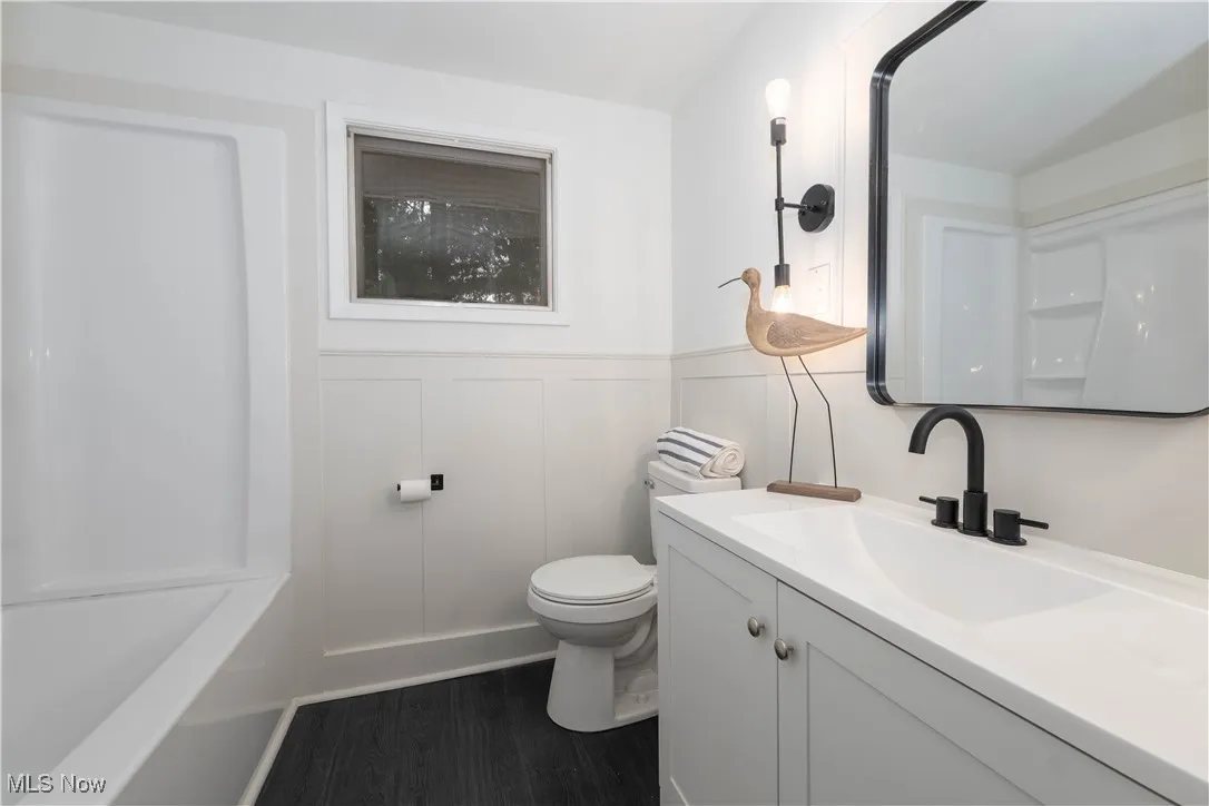 Full bathroom with vanity