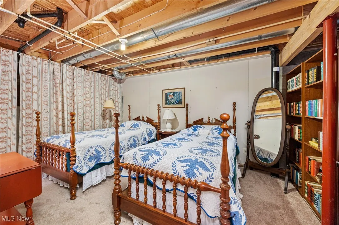 Bedroom featuring carpet floors