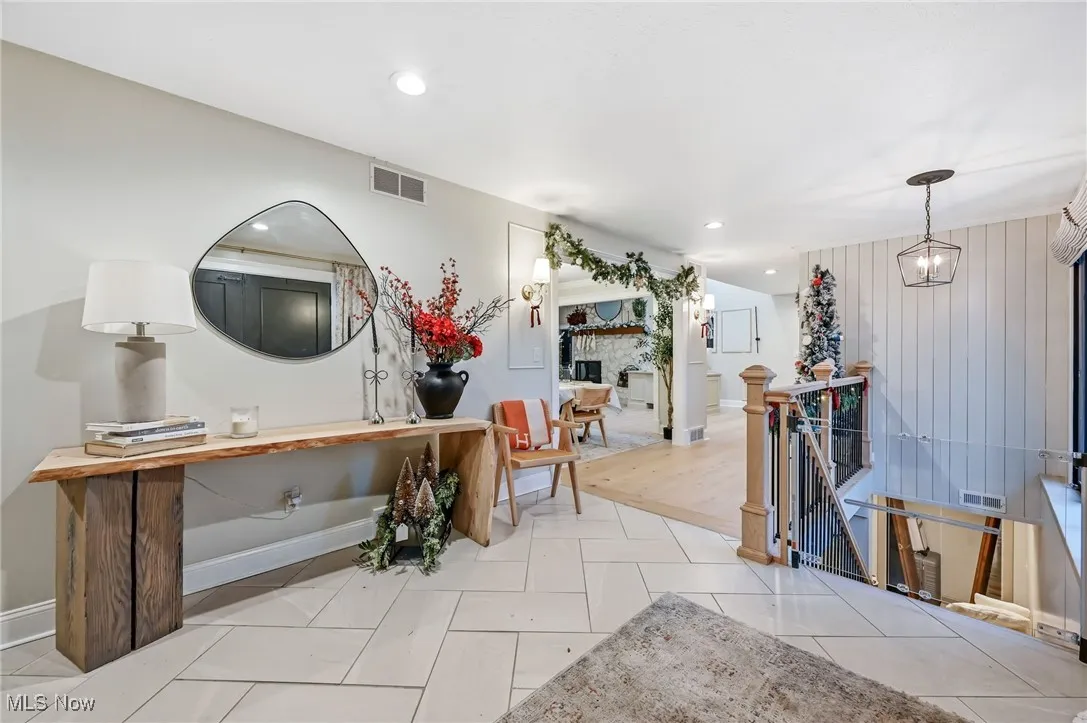 Ceramic tile foyer opens to the rest of the home